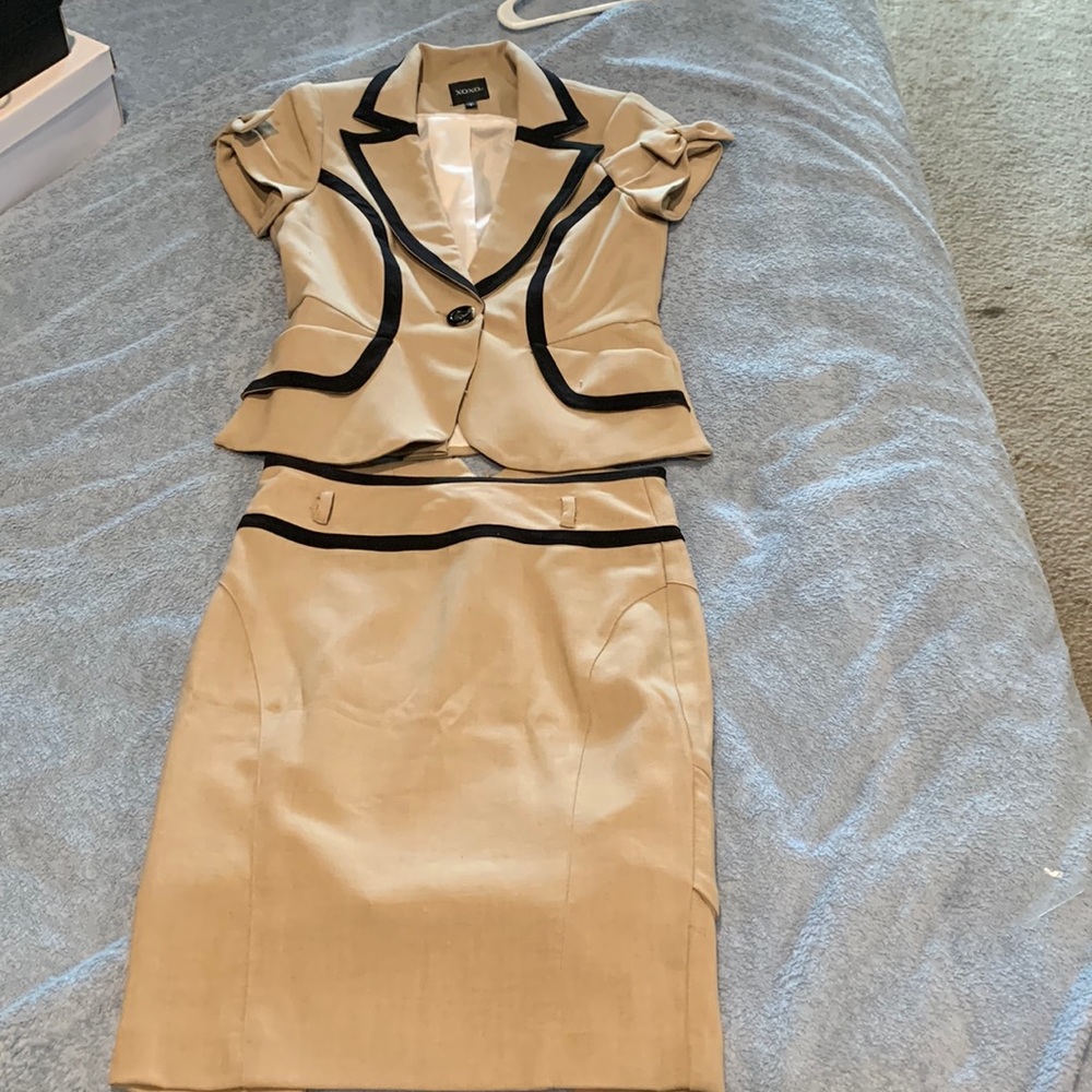 Black and Tan jacket and skirt.